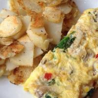 Veggie Omelette · Served with three eggs, home fried potatoes and toast.