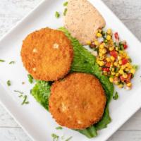 Crab Cakes · Hand formed crab cakes (2) made of crab meat and a super blend of vegetables, seasoning and ...