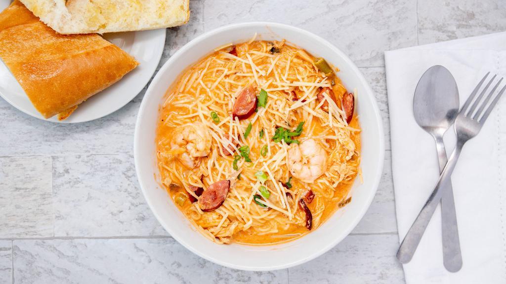 Angel Hair Pasta Dinner · Top menu item. Smoked sausage, shrimp, and chicken tossed around in our secret house sauce, served with fresh french bread.