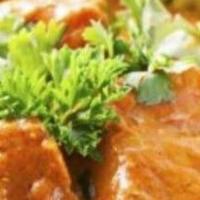 Lamb Korma · Tender pieces of meat cooked in a smooth mild and well balanced special sauce made with cash...