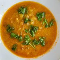 Daal Tarka · Yellow lentils cooked with tomatoes, garlic, roasted cumin seed and freshly blended spices.