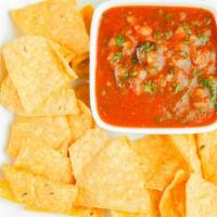 Chips And Salsa 16Oz · Corn chips fried daily.  Homemade salsa with tomato, onion, cilantro, lime, jalapeno