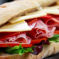 Down Easter Bmt * · Genoa salami, spicy pepperoni, and black forest ham, choice of cheese & vegetables.
Proudly ...