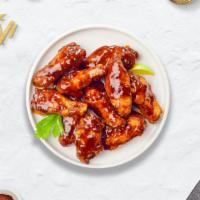 Bbq Bros Chicken Wings · Fresh chicken wings breaded, fried until golden brown, and tossed in barbecue sauce. Served ...