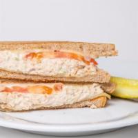 Tuna Melt · Our tuna salad hot with swiss cheese, fresh grill tomatoes