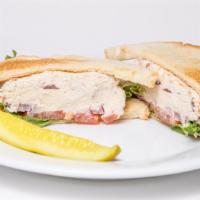 Chicken Salad Sandwich · Cranberry chicken salad served with lettuce, tomatoes and onions