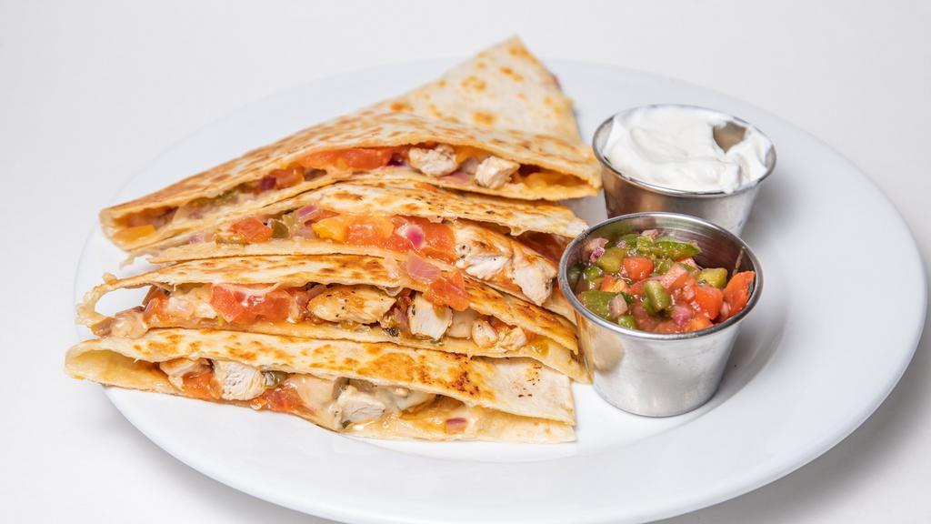 Chicken Quesadillas · grill flour tortilla filled with grill chicken, monterrey jack cheese, tomatoes, onions and jalapenos. served with salsa and sour cream