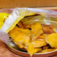 Natural Dried Mangoes · Priced by the half pound.