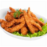 Buffalo Chicken Tenders · Crunchy on the outside, juicy on the inside chicken tenders topped with buffalo sauce.