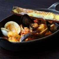 New England Bouillabaisse · Local cod, prawn, clams, mussels, baguette, saffron rouille