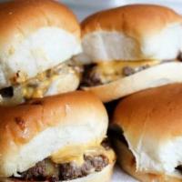Cheeseburger Slider Basket · Choice of 3, 6, or 12 pack of sliders. Served with tomatoes, onion, lettuce, pickles and Ame...
