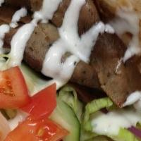 Lamb Gyro · Pita bread, lettuce, tomato, onions with tzatziki sauce.