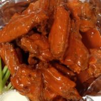 Buffalo Wings · Your choice of mild, hot or honey bbq sauce. Served with bleu cheese and celery.
