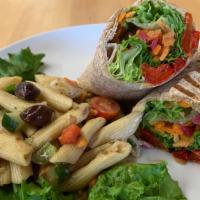 Go Vegan Wrap · Vegetarian. Cucumber, red peppers, carrots, cilantro, pickled onion, garlic hummus, romaine,...