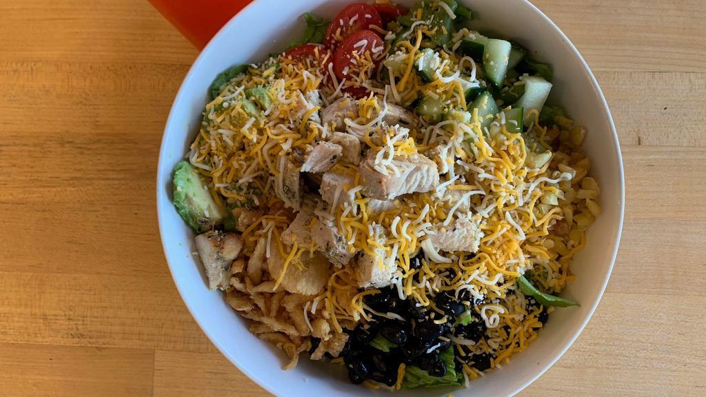Barbeque Chicken Salad · Romaine, grilled chicken, cucumbers, tomatoes, avocado, black bean corn relish, jack & cheddar cheese, cilantro, fried onions, ranch dressing & BBQ drizzle.