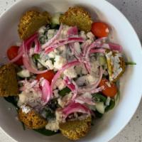 Mediterranean · 310 cal. Quinoa topped with spinach, cucumber, pickled onion, grape tomato, feta, Greek yogu...