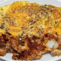 Corn Beef Hash Omelette · Made with six eggs and served with home fries and toast.