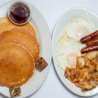 Route 5 · Three eggs, three pancake or three French toast, choice of bacon, ham or sausage and home fr...