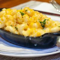 Mac & Cheese · Made with a Cheddar Cheese Blend and topped with Bread Crumbs.