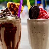 Classic Milkshakes · Choose from Vanilla, Chocolate, Banana, or Strawberry.