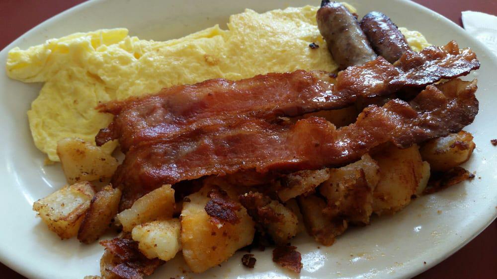 Dempsey'S Ultimate Breakfast · 2 EGGS ANY STYLE, 2 BACON, 2 SAUSAGE, HOMEFRIES, CHOICE OF TOAST & CHOICE PANCAKES OR FRENCH TOAST