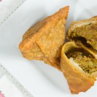 Vegetable Samosas · Lightly spiced potatoes and peas wrapped in pastry dough and deep fried. * 
 
*2 Per order