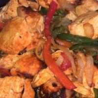 Chicken Tikka · Pieces of boneless chicken, marinated in yogurt and cooked in the tandoor.