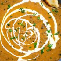 Dal Makhani · Black lentils cooked in a gravy.