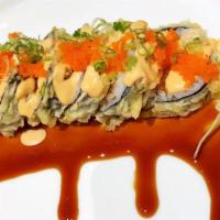 Godzilla · Spicy tuna and avocado in eel sauce, spicy mayo, with masago and scallion on top, eel sauce ...