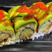 Dragon Roll · Eel, cucumber inside, top with avocado, sesame, caviar, eel sauce.
