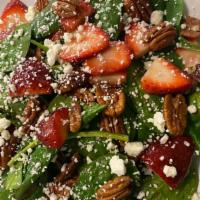 Spinach Strawberry Walnut Salad · Fresh Spinach, Strawberry, California Walnuts and Gorgonzola Cheese drizzled with honey-bals...