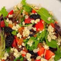 Spring Mix Berry Salad · Blackberries, Strawberries, Blue Cheese crumbles, Sliced Almonds and Golden Raisins with Bal...