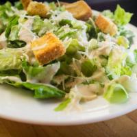 Ceasar Salad · Caesar salad topped with grilled chicken.
