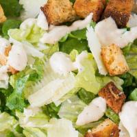 Caesar Salad · Romaine lettuce with grated parmesan cheese, lot of croutons, and caesar dressing.