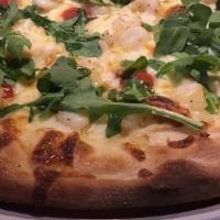 Scampi Pizza · Grilled shrimp, mozzarella, cherry tomatoes, garlic, and arugula.