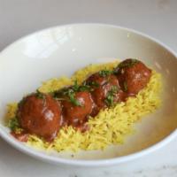 Lamb Goli Kebab · Spiced lamb meatballs served with a Kashmiri chile sauce and saffron rice.