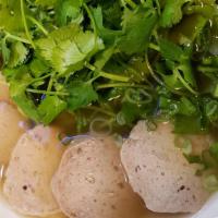 Beef Meatball Soup · Beef meatballs (sliced) in a delicious, aromatic beef broth, garnished with cilantro, scalli...