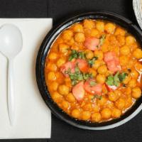 Chana Masala · Chickpeas cooked in a special blend of traditional spices.