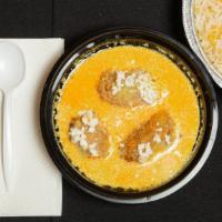 Malai Kofta · Tender homemade cheese dumplings stuffed with raisins and nuts then simmered in a saffron an...