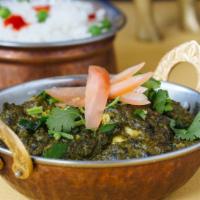Saag · Punjabi dish made of spinach cooked with spices in butter.