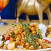 Chat Papri · The mixture of crisps, potatoes and chickpeas in a yogurt and tamarind sauce.