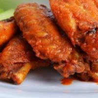 Buffalo Chicken Fingers · Breaded and fried chicken strips tossed in buffalo sauce. add a dipping sauce for an additio...