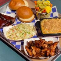 Family Meal For 2 · 2/3 of a pound of your choice of our bbq (pulled pork, brisket, or combo), 3 sides of your c...