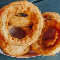 Onion Rings · not your everyday onion rings! light and crispy breading without the heavy greasiness of din...