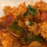 Chicken Chili · Crispy chicken sauteed in mild sweet chili sauce with bell peppers & onions.