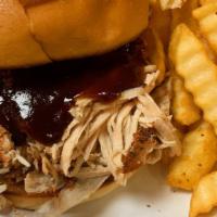 *Pulled Chicken Sandwich · 6 oz of Smoked all white meat Pulled Chicken served on toasted Brioche Roll with your choice...