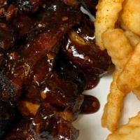 *Rib Tips Platter (12Oz) · 12 oz Platter of Smoked Rib Tips your choice of sauce. Served with 1 side choice.
