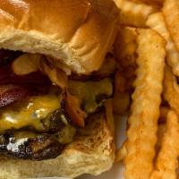 *Texmex Burger · Topped with your choice of BBQ sauce, cheddar jack cheese, bacon and fried onions served on ...