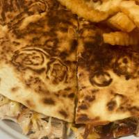 *Chicken Quesadilla · Grilled quesadilla filled with smoked all white meat pulled chicken, cheddar jack cheese and...