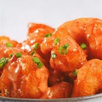 Dynamite Shrimp · Large shrimp lightly breaded and tossed in our hot and sweet chili sauce.